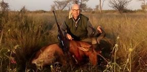 Dr Willem Genis with his Red Hartebeest