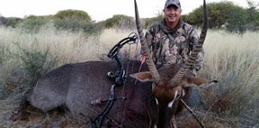 Johan Liebenberg with his Waterbuck